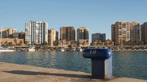 4k wide angle static shot of a busy touristic pier of a city marina with boats, Stock Footage 123490672