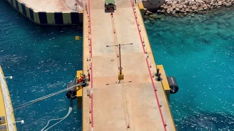 4K Wide High Angle Of Harbor Crew Securing Cruise Ship Mooring Lines Stock Footage 335480150