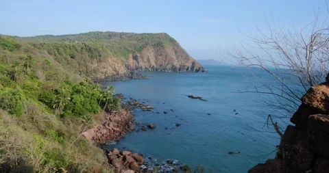 4K wide Landscape view of Mountain hill with blue sea view at indian ocean coast Stock Footage 237530730