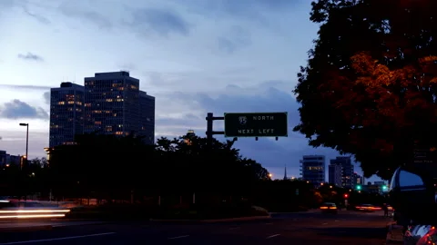 4K WIDE SHOT HYPER TIME LAPSE OF CITY STREET AT DUSK Stock Footage 132074507