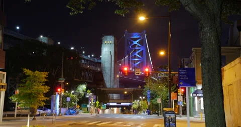 4K WIDE SHOT HYPER TIME LAPSE OF CITY STREET WITH BEN FRANKLIN BRIDGE AT NIGHT Stock Footage 132080880