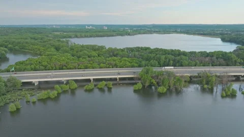 4K Wide Side Scrolling Drone Shot Of 169 Bridge Overlooking Rice Lake Savage MN Stock Footage 278381001