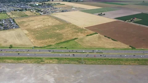 4K wide, static aerial drone footage of Interstate 5 near Woodburn, Oregon, USA Stock Footage 338270862