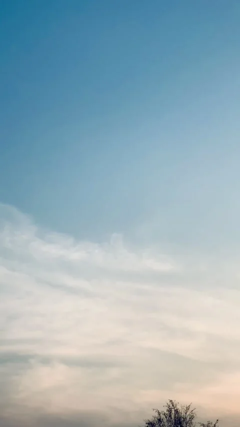 4K Wide Sunset with Dramatic Clouds and Slow Diagonal Tilt in Jakarta Stock Footage 340598484