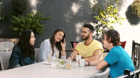 4k wide video multicultural group of young friends chatting and laughing togethe Video stock 201094304