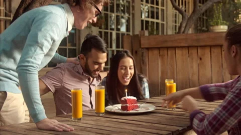 4k wide video of young budget conscious, multicultural group of friends celebrat Stock Footage 201095922