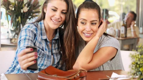 4k wide video young multicultural happy girlfriends taking photo and posing with Stock Footage 201093963