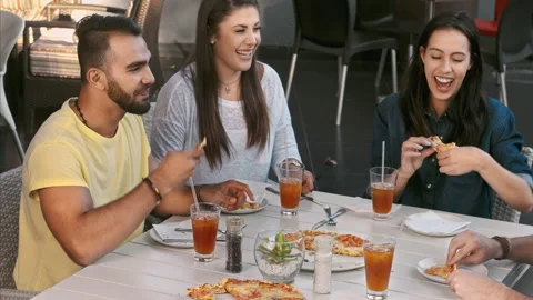 4k wide video of young multicultural group of young friends enjoying a meal, foo Stock-Footage 201095752