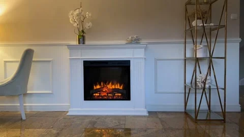 4K wide view of handmade white spruce wooden fireplace mantel with electric fire Vídeo Stock 343158517