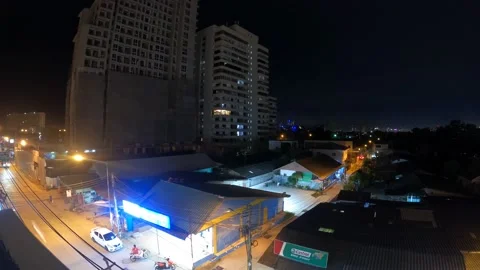 4K  Widescreen Timelapse - Nighttime City Lights. Thunderstorm in Background and Stock Footage 201613497