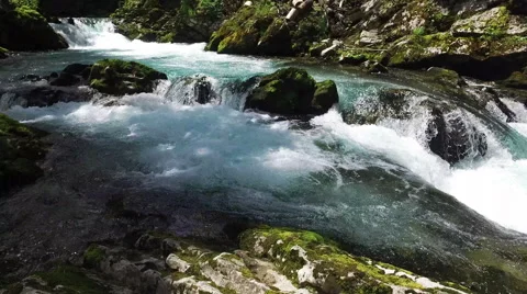 4K. Wild Radovna river flows in Vintgar Gorge. Clean blue water. Video stock 65214399