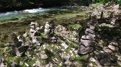 4K. Wild Radovna river flows in Vintgar Gorge and stone pyramids. 動画素材 65407447