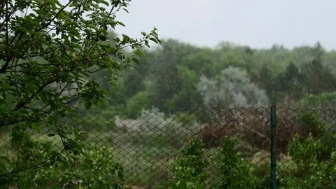 4K The wind-driven rain with the close up view of the drops which make a line Stock-Footage 97521367