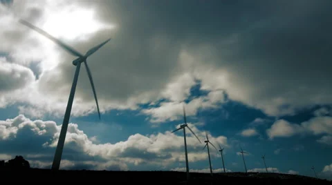 4K wind mill turbines site on mountain timelapse with cloudy sky Stock Footage 47258710