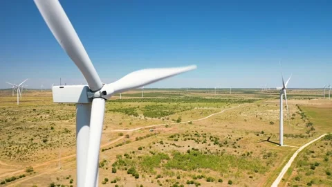 4K Windmill Farm Turbine Engine Aerial View Climate Change Turbine Energy Stock Footage 137216438