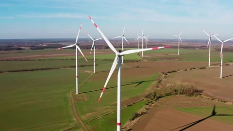 4k windmill turbines, green wind energy, counter clockwise orbit, aerial shot Stock Footage 153993199