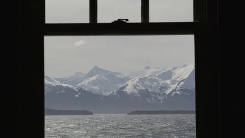 4K: Window Sill View of Alaskan Mountains Meeting the Ocean Stock Footage