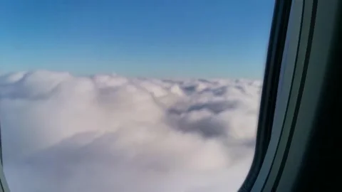 4k window view from the airplane, clouds, aerial shot Stock Footage 295446659