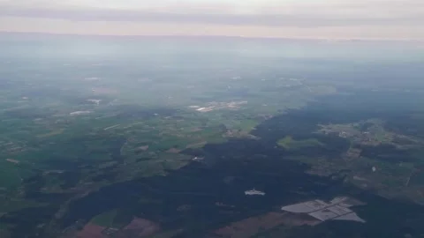 4k window view from the airplane, fields, city, aerial shot Stock Footage 295446692