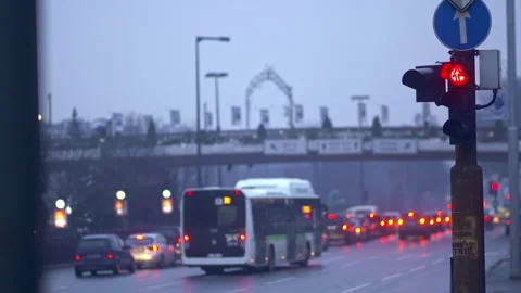 4K winter shot at dusk (evening) with apartment buildings, cars and trucks on 스톡 동영상 334507903