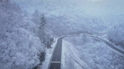 4K Winter Snow Mountain Road Aerial Video Video stock 334100065
