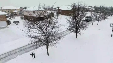 4k Winter storm snow removal from residential streets with snow plough Stock Footage 85676746