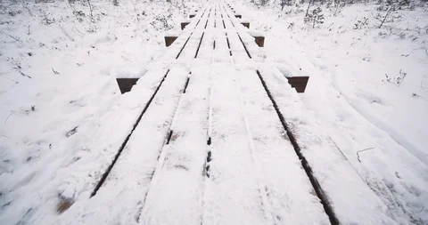 4K - Winter walking trail through the forest. Wide view Stock Footage 100438872