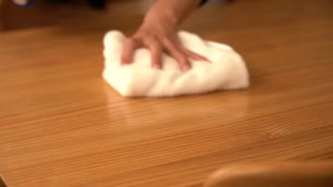 4K wipe the table to do sanitation and disinfection close-up video Stock Footage 333684760