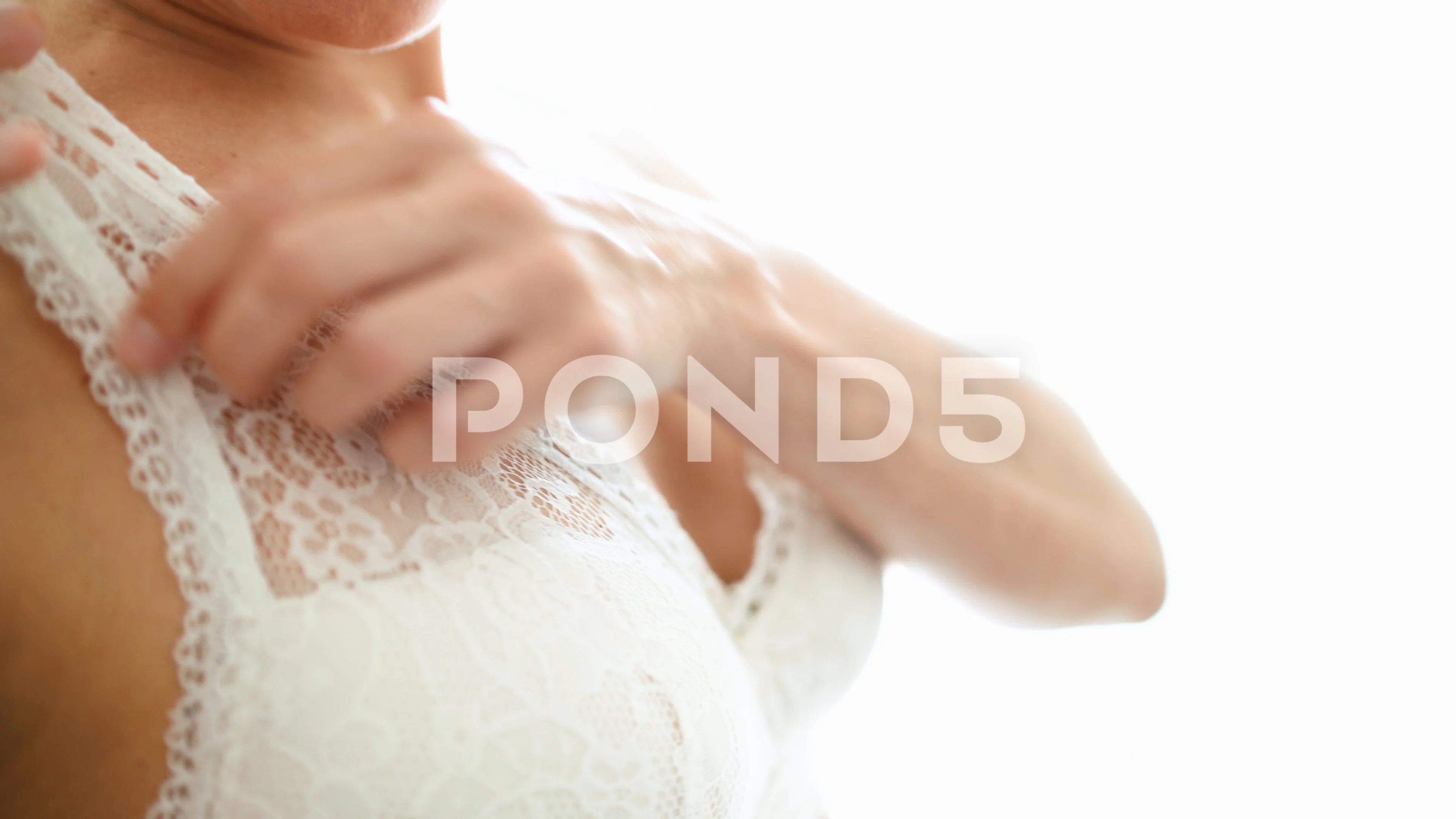 https://images.pond5.com/4k-woman-adjusting-her-bra-footage-111369054_prevstill.jpeg