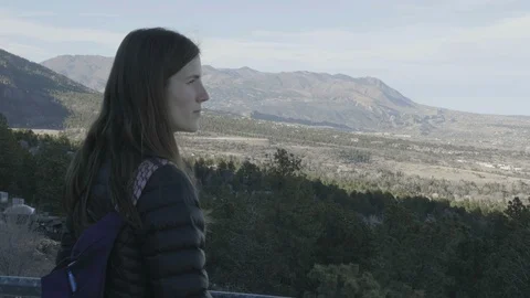 4K Woman Looking Over Mountain Range From Vantage Point in Colorado Springs Stock-Footage 102777068