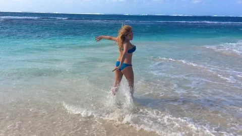 4K Woman Running & Dancing On The Beach In Slow Motion Anguilla Stock Footage