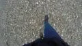 4K woman walking on pebbly and sandy beach, feet visible 4k or 4k+ Resolution