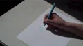 4K woman writing Will You Marry Me in felt pen on white paper 4k or 4k+ Resolution