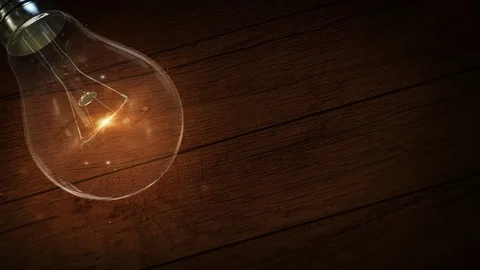 4K Wood background. Light bulb Thinking. Idea innovation and solution. Vintag Stock Footage 112607994