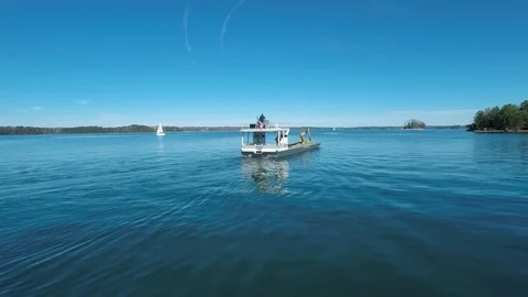 4k-Work Barge On lake Stock Footage 103175935