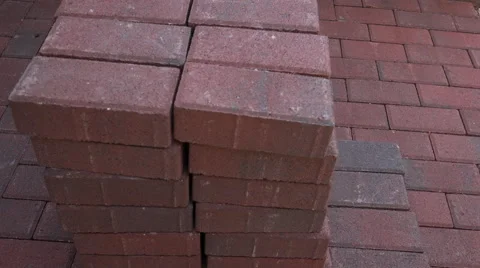 4K Worker Piles Brick Pavers On Pavers Time Lapse Stock Footage 62546064