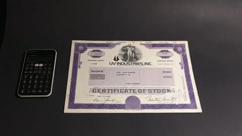 4K Write Worthless on Real Stock Certificate after company bankrupcy Stock Footage 282236093