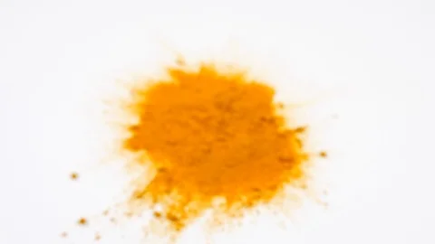 4K Yellow Turmeric on white surface background, focus pull herbs and spices Stock Footage 88480121