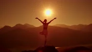 4K Yoga In The Mountains,The Sunrise, A Beautiful Girl Dressed In White ,Pulls Stock Footage