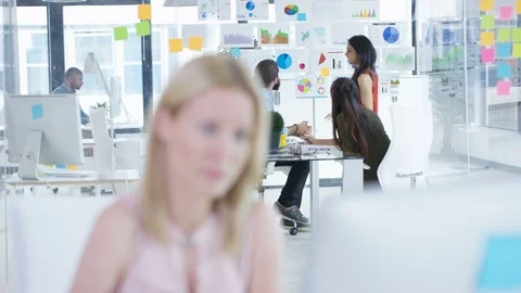 4K Young attractive business group working &amp; collaborating in modern office Video stock 76043553