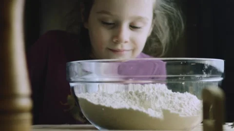 4K Young Baker Standing Behind a Bowl of Flour During Cookie Preparation Stock Footage 342113368