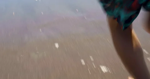 4K | Young Boy Running On the Beach, Carefree Stock Footage 137764086