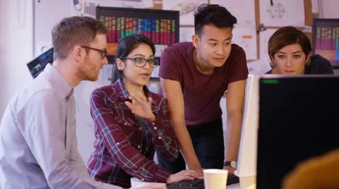 4K Young computer experts working in office with lots of computers Stock Footage 60916934