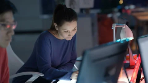 4K Young computer game designer drawing &amp; working on computer Stock Footage 67572250