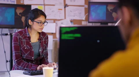 4K Young computer hackers trying to gain access to a computer system Stock Footage 60925885