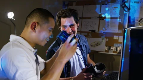 4K Young computer programmers trying out virtual reality viewers Stock Footage 54398831