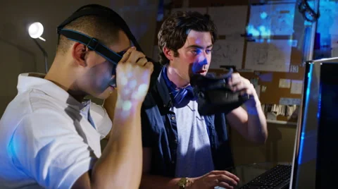 4K Young computer programmers trying out virtual reality viewers Stock Footage 54400146