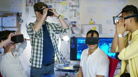4K Young computer programmers trying out virtual reality viewers 스톡 동영상 54452340