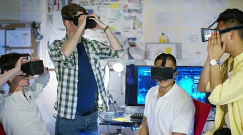 4K Young computer programmers trying out virtual reality viewers 스톡 동영상 54452341
