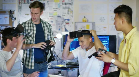 4K Young computer programmers trying out virtual reality viewers 스톡 동영상 54453739